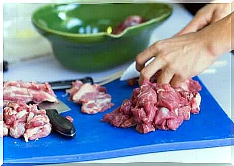 Cutting of raw meat. 