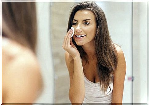 woman removing makeup